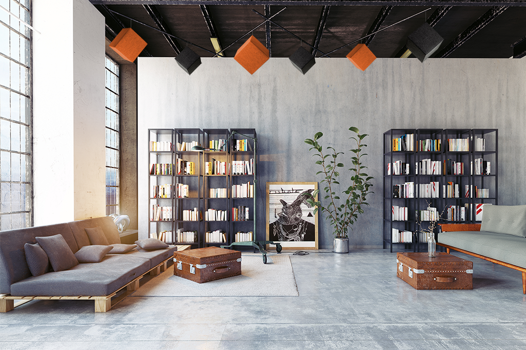 Modern living room with two sofas facing each other, colored acoustic cubes suspended from the ceiling.