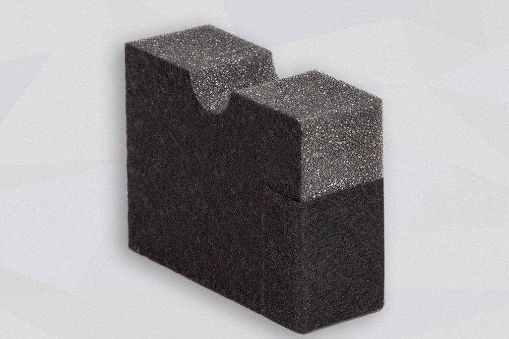 Small foam sample with one edge taped over with soni VLC adhesive tape
