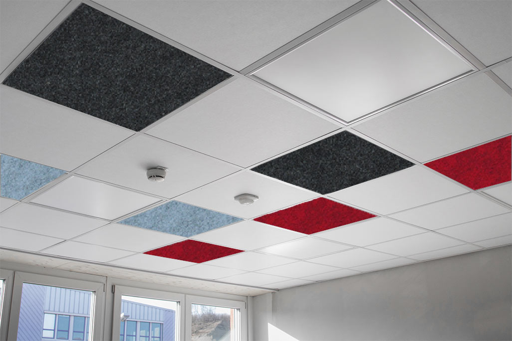Grid ceiling with white and colored inserts that improve the room acoustics.
